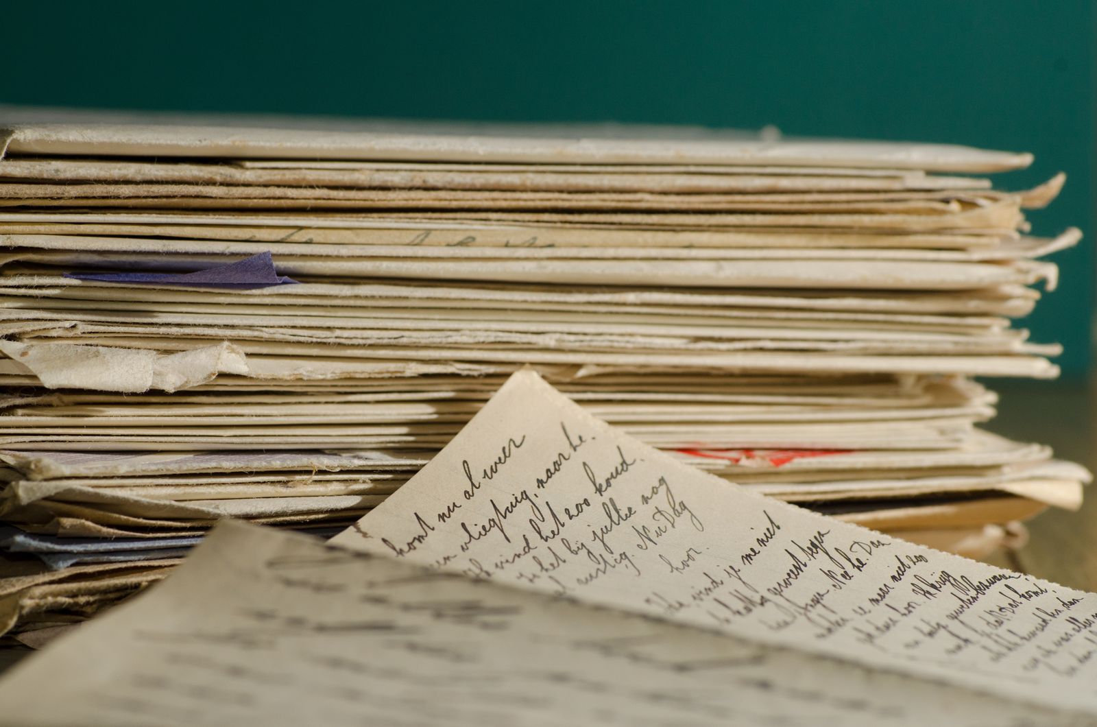 Stack of handwritten letters and envelopes